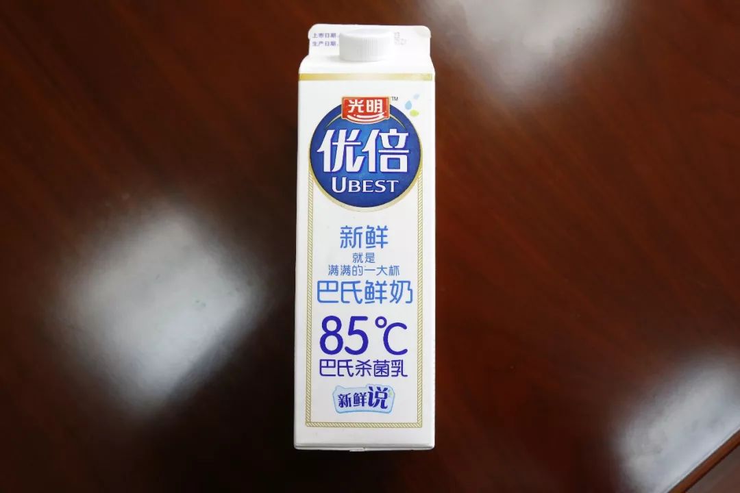 光明牛奶包裝盒上標識“85℃”是否侵權85度C品牌的商標權？